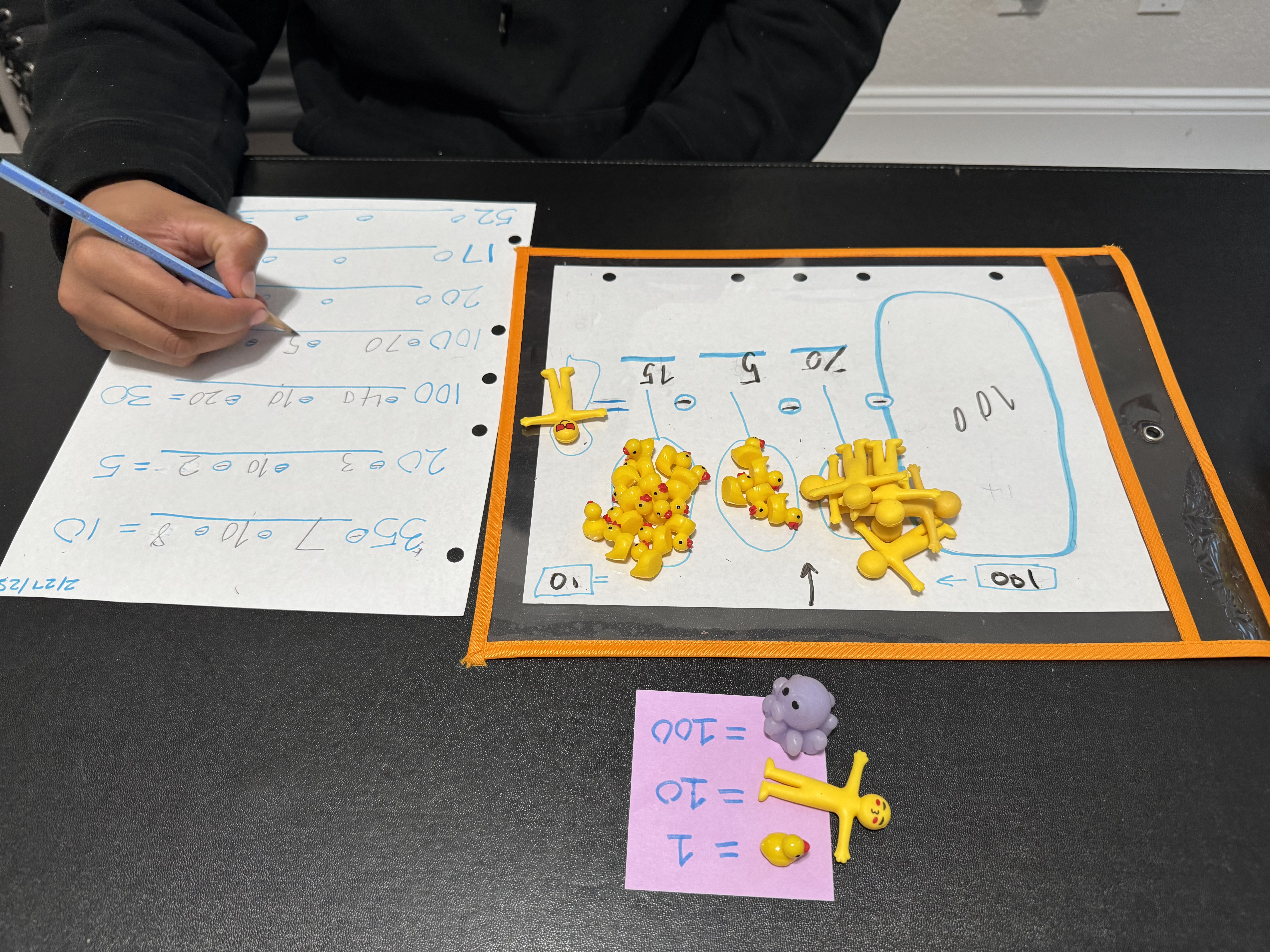 Math lesson with rubber duckies as manipulatives